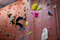 Determined boy practicing rock climbing Royalty Free Stock Photo