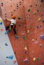 Determined boy practicing rock climbing Royalty Free Stock Photo