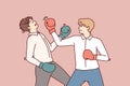 Determined business man in boxing gloves strikes opponent in face, symbolizing fierce competition