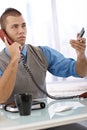 Determined businessman on phone