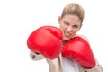 Determined businesswoman with boxing gloves Royalty Free Stock Photo