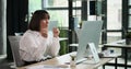 Businesswoman Experiencing Setback at the Office Computer