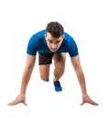 Determined caucasian man runner standing in running position looking ahead confident, full length portrait