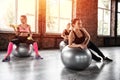 Girls working out at a gym with the gymball Royalty Free Stock Photo