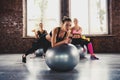 Girls working out at a gym with the gymball Royalty Free Stock Photo