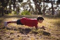 Determined kid exercising during obstacle course