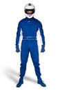 Determined race driver in blue white motorsport overall shoes gloves and integral safety crash helmet isolated white background.