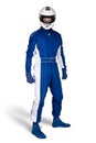 Determined race driver in blue white motorsport overall shoes gloves and integral safety crash helmet isolated white background.