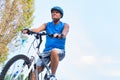 Determined senior man riding bicycle in park Royalty Free Stock Photo