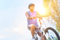 Determined senior man riding bicycle in park Royalty Free Stock Photo