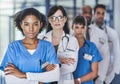Determined to do whats best for your health. Portrait of a diverse team of doctors standing together in a hospital.