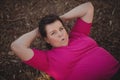 Determined woman exercising during obstacle course