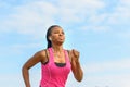 Determined young African woman working out jogging Royalty Free Stock Photo