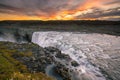Detifoss waterfall with sunset in the background Royalty Free Stock Photo