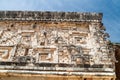 Detil of the stonework at the Palacio del Gobernador Governor`s Palace building in the ruins of the ancient Mayan city