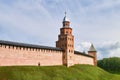 Detinets or Novgorod Kremlin red brick fortress walls. Kokui watchtower in summer day in Veliky Novgorod, Russia. Travel concept,