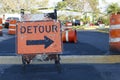 Detour sign in roadway