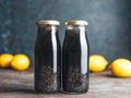 Detox activated charcoal black chia lemon water Royalty Free Stock Photo