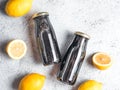 Detox activated charcoal black chia lemon water Royalty Free Stock Photo