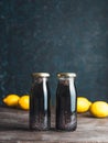 Detox activated charcoal black chia lemon water Royalty Free Stock Photo