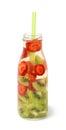 Detox beverage of strawberry, kiwi in glass bottle, isolated on white background. Royalty Free Stock Photo