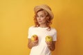 detox. cheerful girl with apple fruit. vitamin and dieting. woman in straw hat Royalty Free Stock Photo