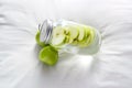 Detox diet fresh green apples soak in water of the jar