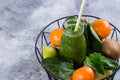 Detox Dieting, Clean Eating Vegan Drink Concept. Fresh Green smoothies on concrete gray table Royalty Free Stock Photo