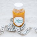 Detox drink with measuring tape. Free space for text. Concept: detox and fitness, diet and exercises Royalty Free Stock Photo
