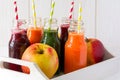 Detox drinks in bottles: fresh smoothies from vegetables: beet, carrot, spinach, cucumber and apple Royalty Free Stock Photo