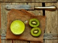 Detox food with kiwi smootie on a wooden table