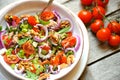 Detox food with veggie, raw salad with tomato and walnuts Royalty Free Stock Photo