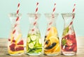 Detox fruit infused flavored water. Refreshing summer homemade cocktail