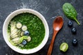 Detox green smoothie in bowl