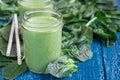 Detox green smoothie with spinach, pineapple, banana and yogurt, copy space Royalty Free Stock Photo