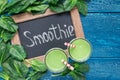 Detox green smoothie with spinach, pineapple, banana and yogurt, top view, copy space Royalty Free Stock Photo