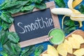 Detox green smoothie with spinach, pineapple, banana and yogurt, top view Royalty Free Stock Photo