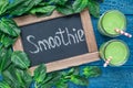 Detox green smoothie with spinach, pineapple, banana and yogurt, top view Royalty Free Stock Photo