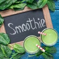 Detox green smoothie with spinach, pineapple, banana and yogurt, top view, square Royalty Free Stock Photo