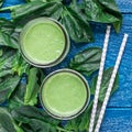 Detox green smoothie with spinach, pineapple, banana and yogurt, top view, square Royalty Free Stock Photo