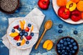 Detox and healthy superfoods breakfast bowl concept. Vegan coconut milk chia seeds pudding over rustic table with various fruits Royalty Free Stock Photo