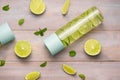 Detox Infused Water with Lime and Mint in Sports Bottle, with slices of lime. Royalty Free Stock Photo