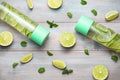 Detox Infused Water with Lime and Mint in Sports Bottle, with slices of lime. Royalty Free Stock Photo