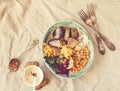 Detox lunch with a purple potato, stewed spinach, and hummus with corn crackers.Toning