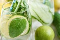 Detox refreshing sassy water with cucumber, ginger, mint and lemon in glasses