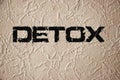 Detox text on grunge light wall. Healthcare concept Royalty Free Stock Photo