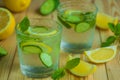 Detox water, fresh organic lemonade with ice, cucumber, lemon an Royalty Free Stock Photo