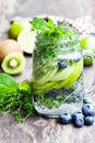 Detox water. Homemade summer fruit drink with lime and kiwi and Royalty Free Stock Photo