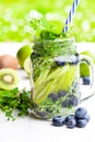 Detox water. Homemade summer fruit drink with lime and kiwi and Royalty Free Stock Photo