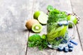 Detox water. Homemade summer fruit drink with lime and kiwi and Royalty Free Stock Photo